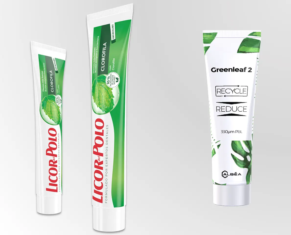 Recyclable toothpaste tubes lined up next to each other.